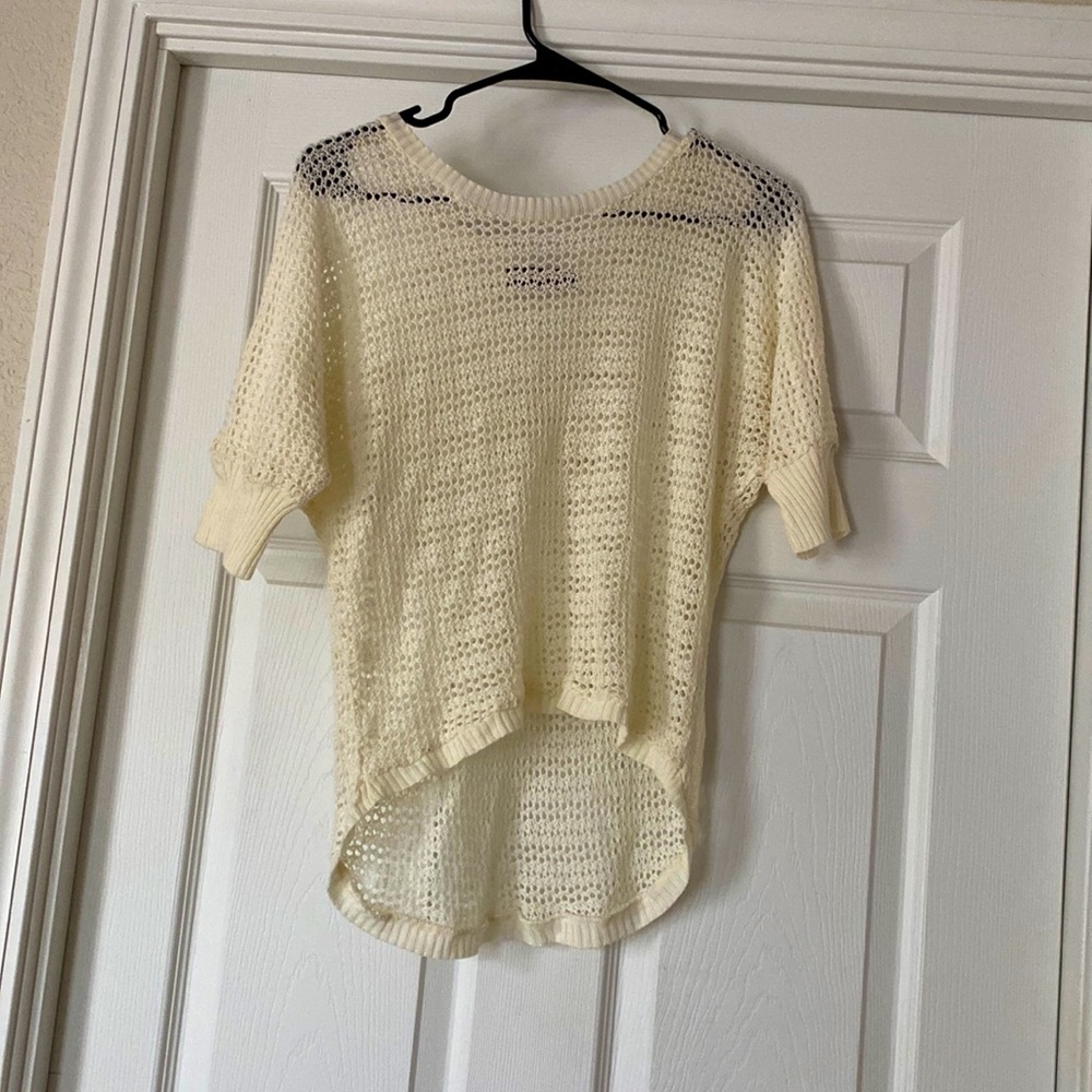 Creme colored, knitted mesh top